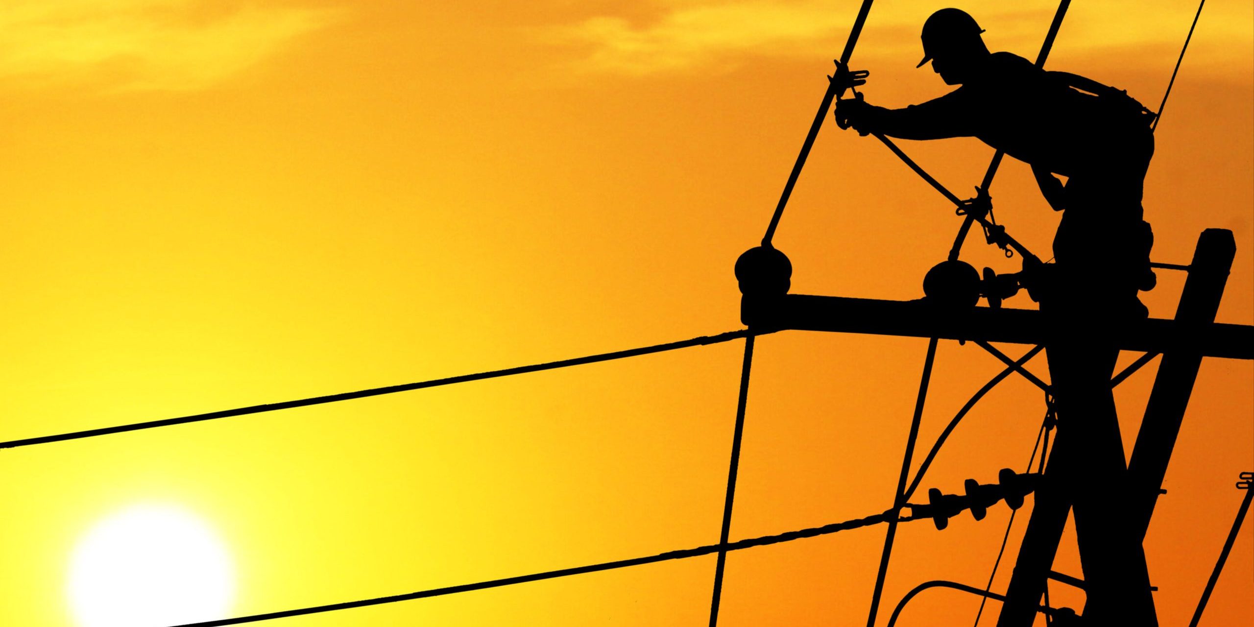 ey-electricity-post-worker-sunset.jpg