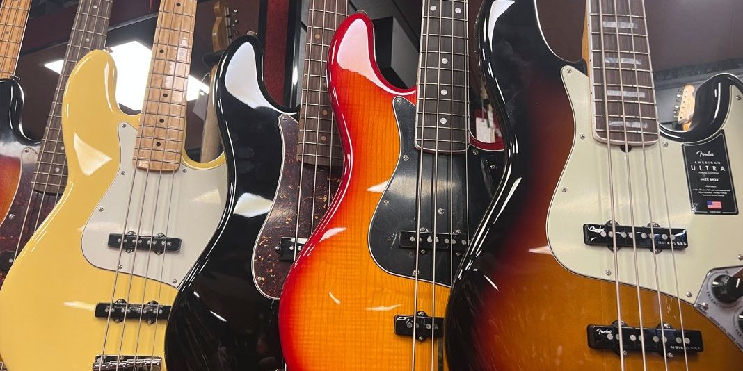 Guitars-on-a-wall@2000×1500-1068×801.jpg