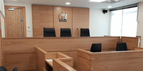 court-hearing-e1744803898245.png
