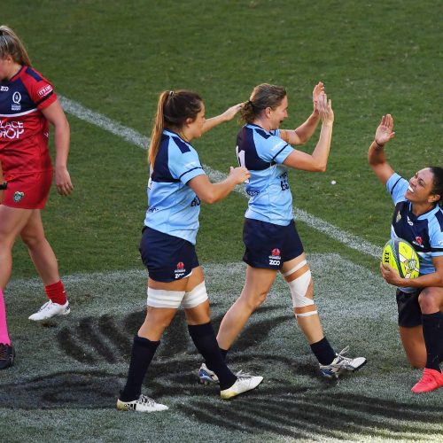 NSW's Cobie Jane Morgan celebrates her try with team mates.
Waratahs v Reds Womens match. Brisbane Global Rugby 10s, Suncorp Stadium, Brisbane, Australia. Day 1, Friday 9 February 2018. © Copyright photo: Andrew Cornaga / www.photosport.nz